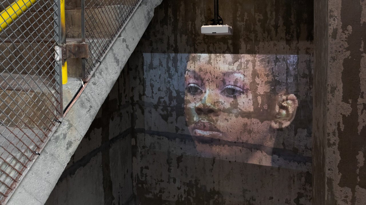 thenjiwe niki nkosi - suspension installation view projection in stairwell